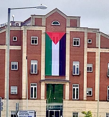 Ecotricity HQ draped in the Palestinian flag.