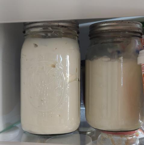 Two ball mason jars full of yoghurt