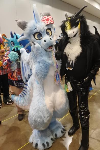 Arkie the dragon and Terry - a blue fluffy dragon and a punk dragon in a leather jacket and PVC jeans which they would not like at Confuzzled