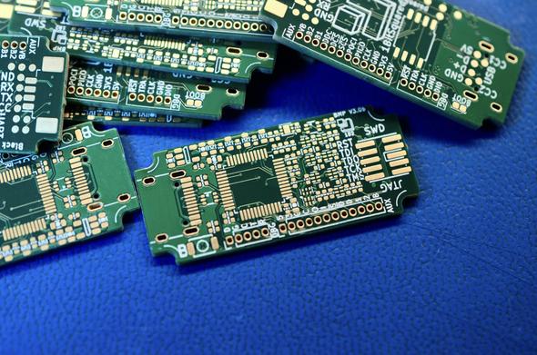 Black Magic Probe V3.0b PCBs. Green solder mask, golden pads. 0.1mm trace space rules, 0.2mm drill plugged via in pad, and high resolution silkscreen. The resistors are now all 0402, no 0201 on board this time.