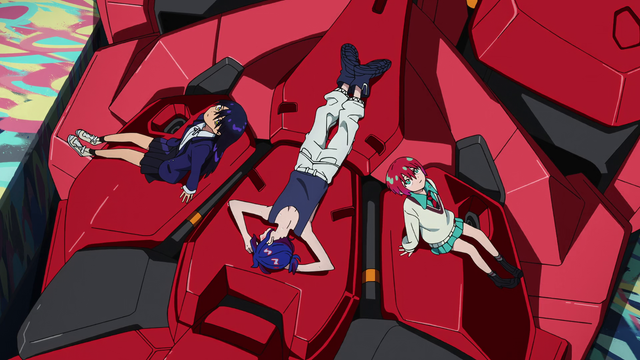 The three teenage protagonists of the series, chilling on the Red Gundam. At the center there's Shuji, lying face down; the girls, Nyaan (left) and Machu (right) are both sitting giving their backs to him and looking up.