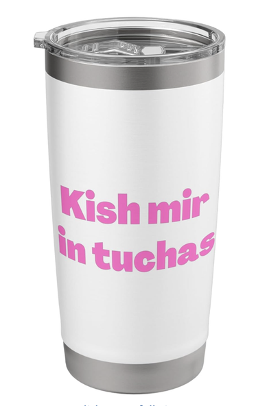 The Yiddish curse Kish mir in tuchas is shown in pink lettering on a stainless steel tumbler.