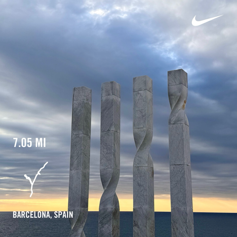 7.05 miles run and post-sunrise skies in Barcelona by the sculpture behind the W Hotel