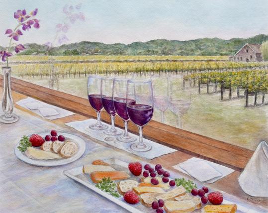 Four glasses of red wine with cheese and fruit plates on a table. Through a large window is a vineyard with hills in the distance. A view from the Napa Valley Wine Train.