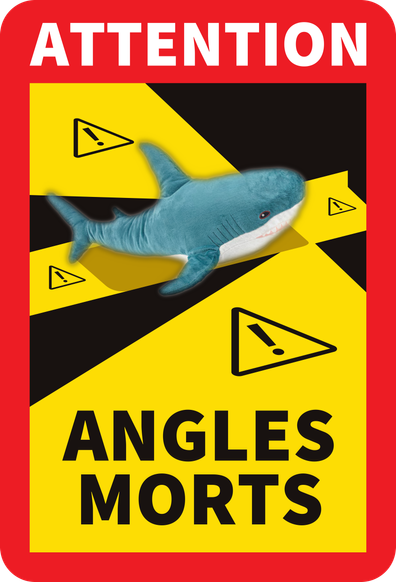 WARNING! ANGLES MORTS

A black and yellow warning for blind spots, usually found on the side of French lorries. The lorry (with the blind spots) has been replaced with the IKEA shark Blåhaj.