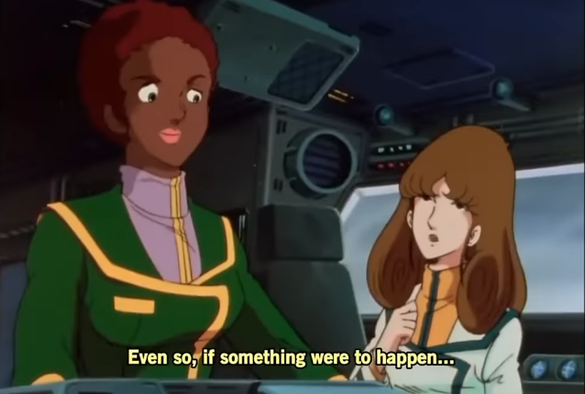 Two women from Macross, Claudia and Misa. Claudia has dark brown skin and short reddish hair. Misa has pale skin and long brown hair.