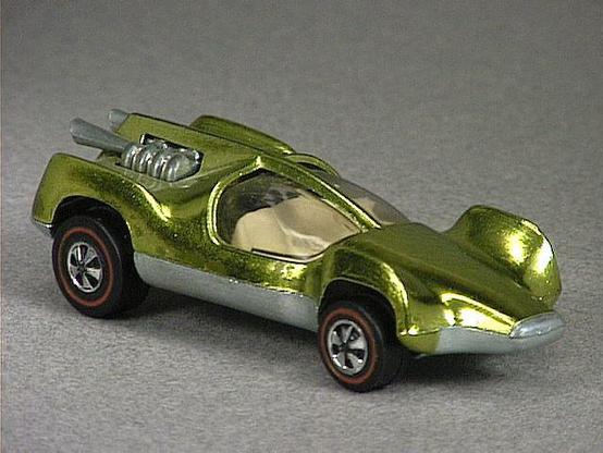 Released in 1970, Spectraflame Brown Mantis of 1970 Hot Wheels with Redline wheels. Notes: US casting has a larger nose and longer steering wheel. Packaging: 1970 Blister. Metal Body, Metal Base. Made in USA. Scarcity: 4/10