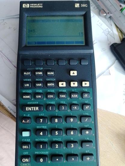 An HP38g in operation, with a very non rpn equation on the screen. It works. Probably quite a nice calculator actually. But do I want it?