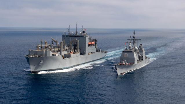 USS Chosin (CG 65) and USNS Washington Chambers (T-AKE-11) conduct a Transferrable Rearming Mechanism (TRAM)
