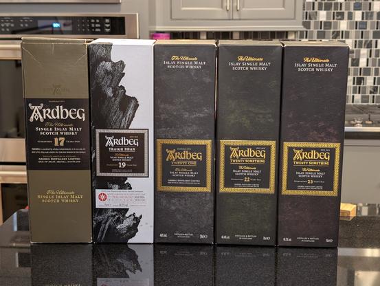 Five Ardbeg bottles