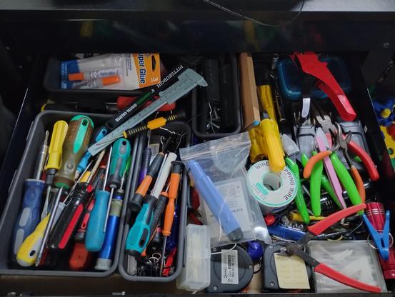 Very messy tool draw on the work bench