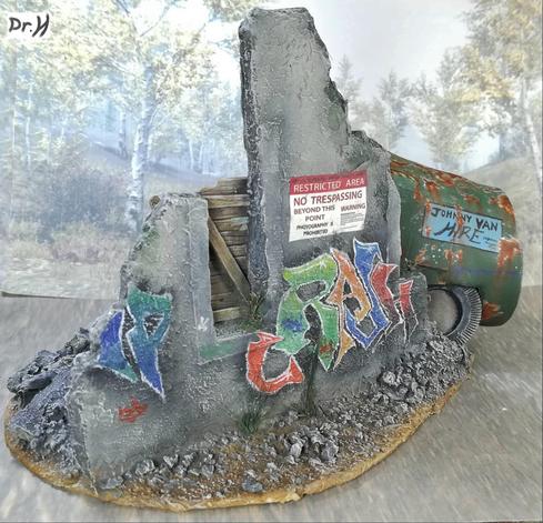 Outside of the ruined building, the rear of the van is peeking out.