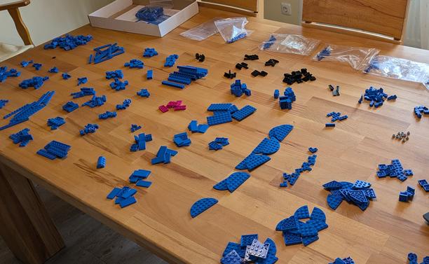 Lego on a Wooden Table, separated by type