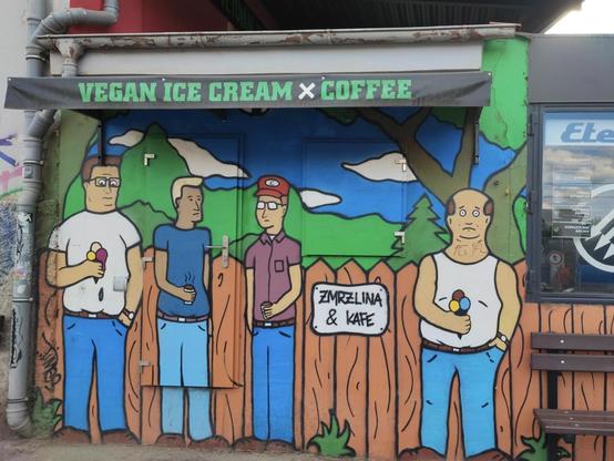 King of the Hill mural on a cafe facade