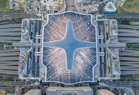 An aerial view of the 7,540 photovoltaic modules arranged on the roof of Hangzhou West Railway Station, on August 6, 2024, in Hangzhou, Zhejiang province, China. Image Via: Zuo Dongchen / VCG / Getty