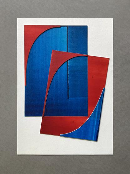 Collage art in blue and red on white paper. Presented on a gray background.