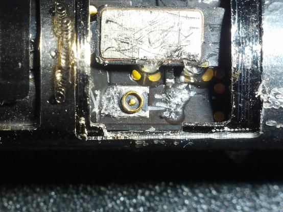 I tiny ufls-02 antenna connector on a pcb under the microscope