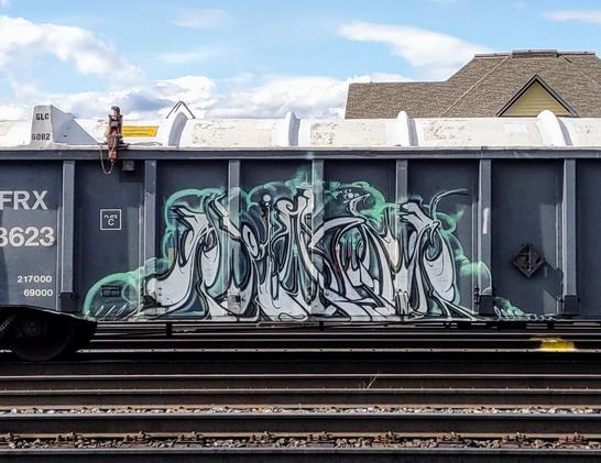 Train car with graffiti rolling through Kamloops BC Canada