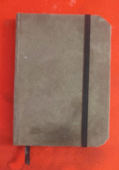 moleskine like notebook handmade. With brown bookcloth, and black elastic and bookmark.