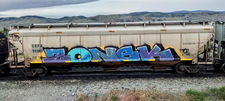 Train car with graffiti rolling through Kamloops BC Canada