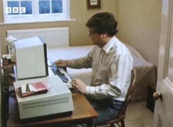 Chris at home with BBC micro and IBM.  

source https://youtube.com/watch?v=jbu0kmCeLSI