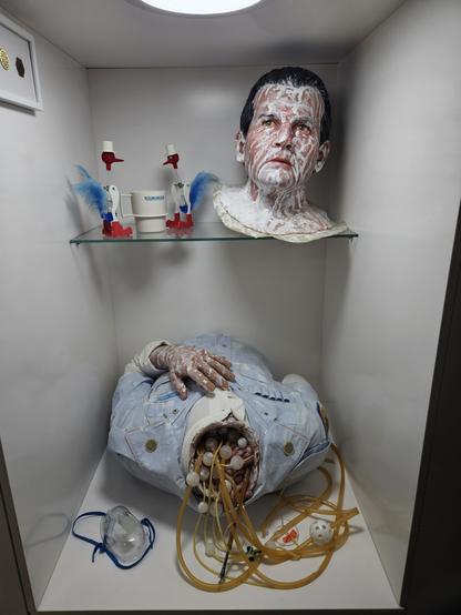 Replicas of Ash the Androids body after being decapitated