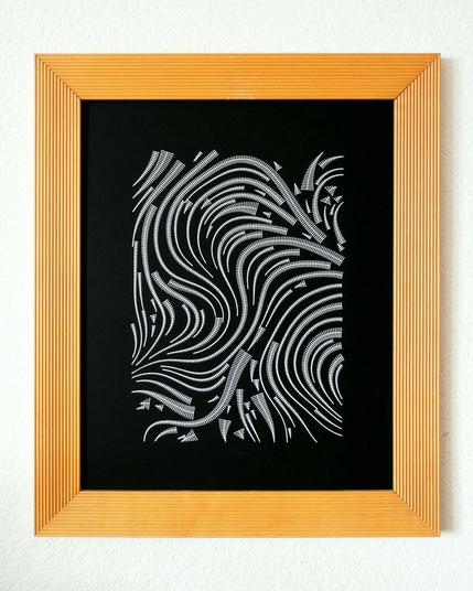 Abstract artwork in a frame on a wall.
White lines on black paper. Composition of white ribbons made of stripes following a flow field without intersection