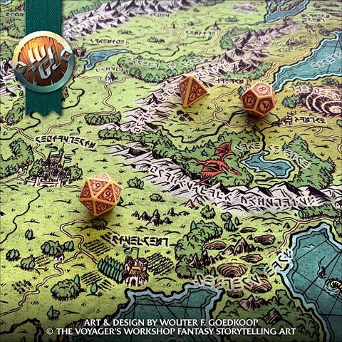 A closeup photo of a large printed fantasy world  map showing a hilly seaside region with vineyards, cenotes and a large city. In between some polyhedral dice we can see a red dragon gliding over a long mountain range.
