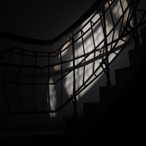 Photo of a staircase, inside a house in Prague