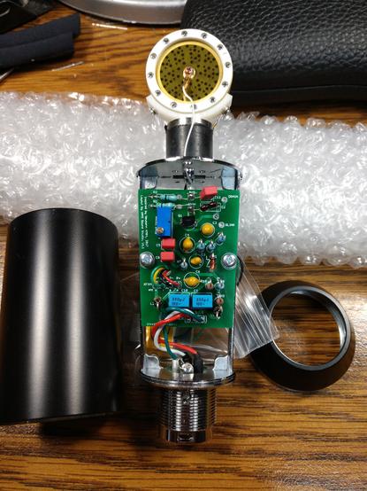 A FET847 microphone opened up showing the amplifier PCB.