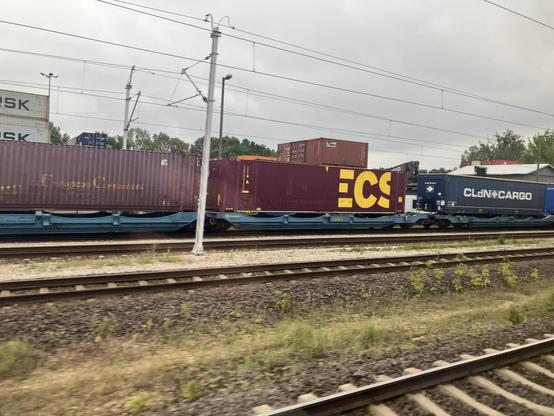 Containers from ECS on a train