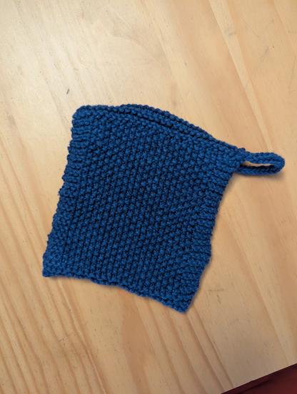 The back of the soap sack, showing a textured seed stitch surface.