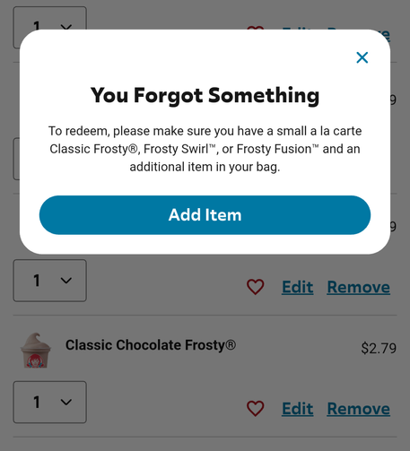 A screenshot of the Wendy's app telling the user "you forgot something," while while the same screenshot shows that the qualifying offer is in the cart.