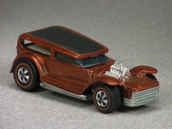 Released in 1970, Spectraflame Orange Demon of 1970 Hot Wheels with Redline wheels. Notes: Roof painted black. Packaging: 1970 Blister. Metal Body, Metal Base. Made in Hong Kong. Scarcity: 4/10