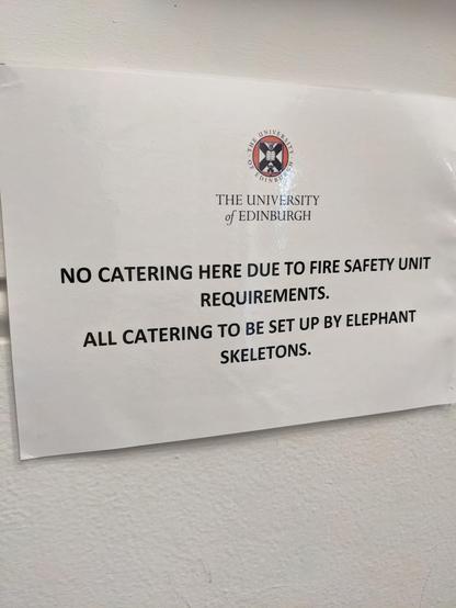 Edinburgh University sign reading: 
NO CATERING HERE DUE TO FIRE SAFETY UNIT REQUIREMENTS.

ALL CATERING TO BE SET UP BY ELEPHANT SKELETONS.