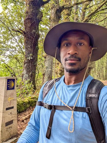 Me in front of a Camino sign