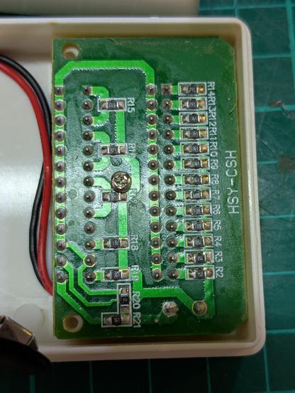 the main PCB showing the SMD resistors for each test slot.