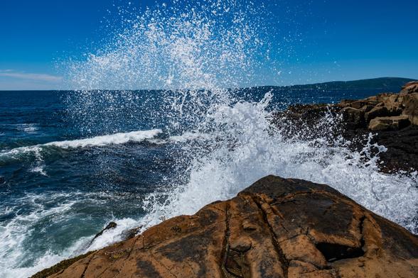 Waves crash onto rocks and slpash high in the air.
© Tom Goetz. All rights reserved. Training an AI on this image is expressly forbidden.