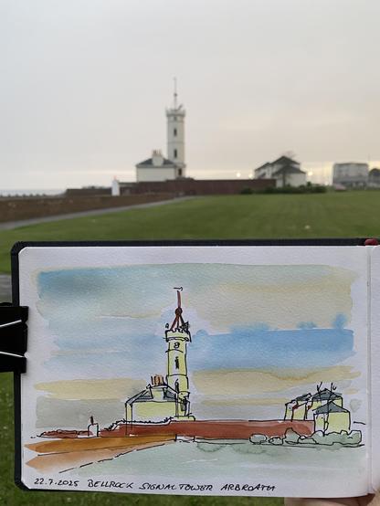 A signaltower with a red ball on top of a somehow medieval looking tower in pale colours, in front a sketchbook with a coloured drawing of it with exaggerated colours.
