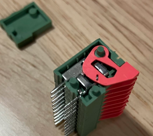 Partially-disassembled lever-wire connector