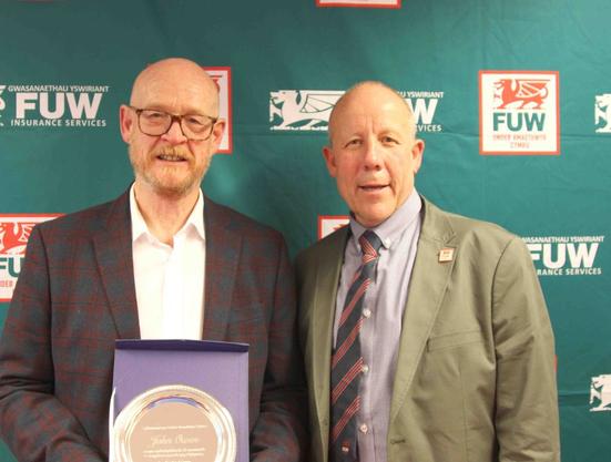 At this year’s Royal Welsh Show, John Owen was recognised for his outstanding contribution to Welsh farming, winning the Farmers’ Union of Wales (FUW) External award for services to agriculture.