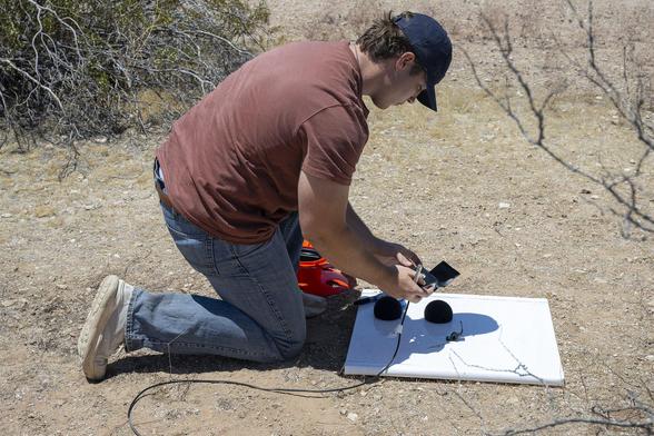 NASA_Intern_Sets_Up_Ground_Recording_System_Units_(AFRC2025-0091-65).jpg
