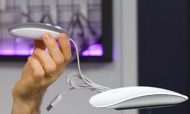 A chinese fake Magic mouse out of plastic with a wired USB-A cable