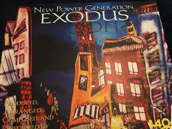 A section of the back of the outer sleeve of New Power Generation’s Exodus LP on vinyl, showing the track listing