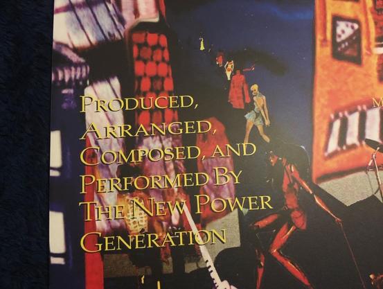 A section of the back of the outer sleeve of the New Power Generation’s Exodus LP on vinyl. It reads: “Produced, arranged, composed, and performed by the New Power Generation”