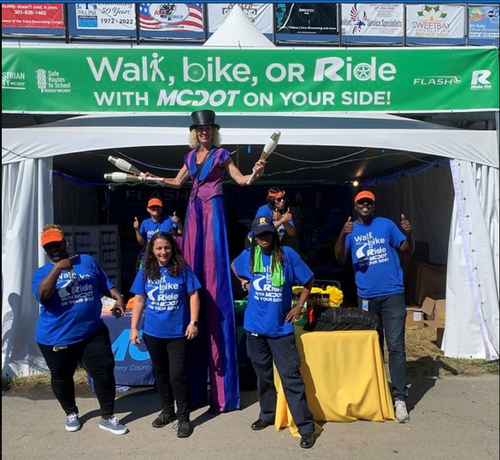 images of workers at the moco fair booth in 2024