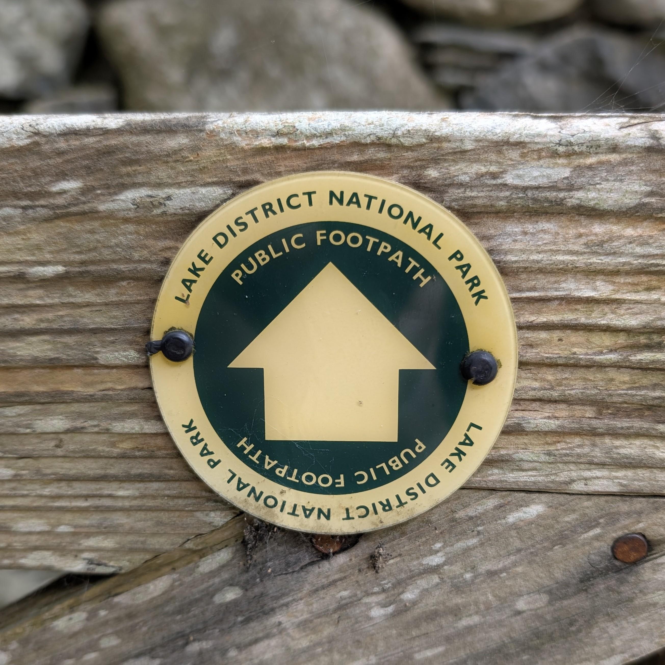 A National Parks sign for a footpath.