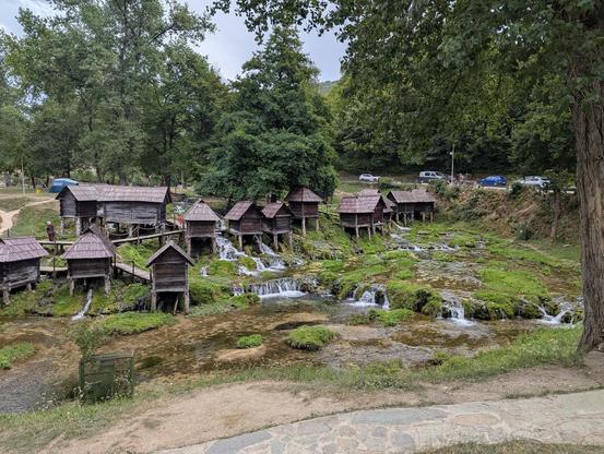 A picture of the small water mills in Pliva lakes