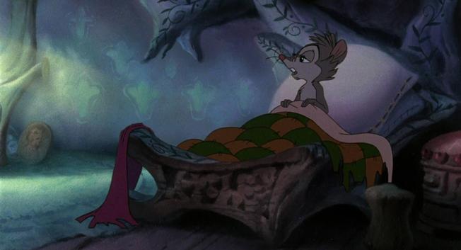 Screenshots of the cartoon movie "Secret of NIMH".

Miss Brisby, a little mouse, is sitting upright in her dark bedroom, holding the blanket of her bed in her tiny paws.

Her eyes are half-opened and she still looks tired as she looks to the left, he mouth slightly opened, showing her big front teeth.

Miss Brisby is a brown mouse woman, due to the dark lightning in this shot she looks mostly gray. Being a mouse, she's not wearing clothes in this shot, the fur of her upper body is visible.

Her bed and most of her bedroom is made of wood or soil, parts of wooden roots visible on the walls.

Her bed has a tiny pillow behind her and the blanket seems to be made from stitched together red and yellow cloth squares.
