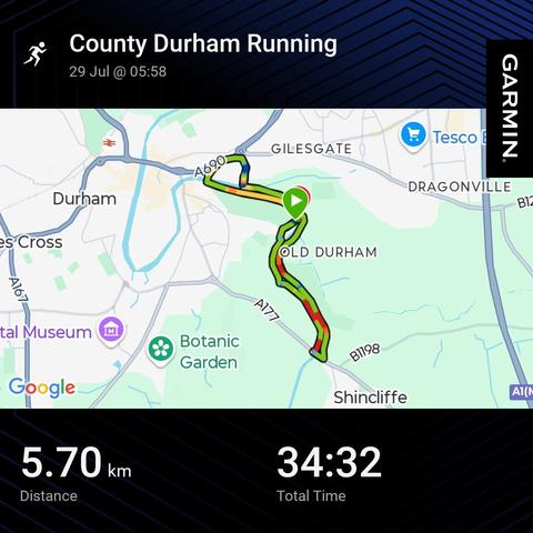 Garmin activity showing a running session. 5.7km 35min